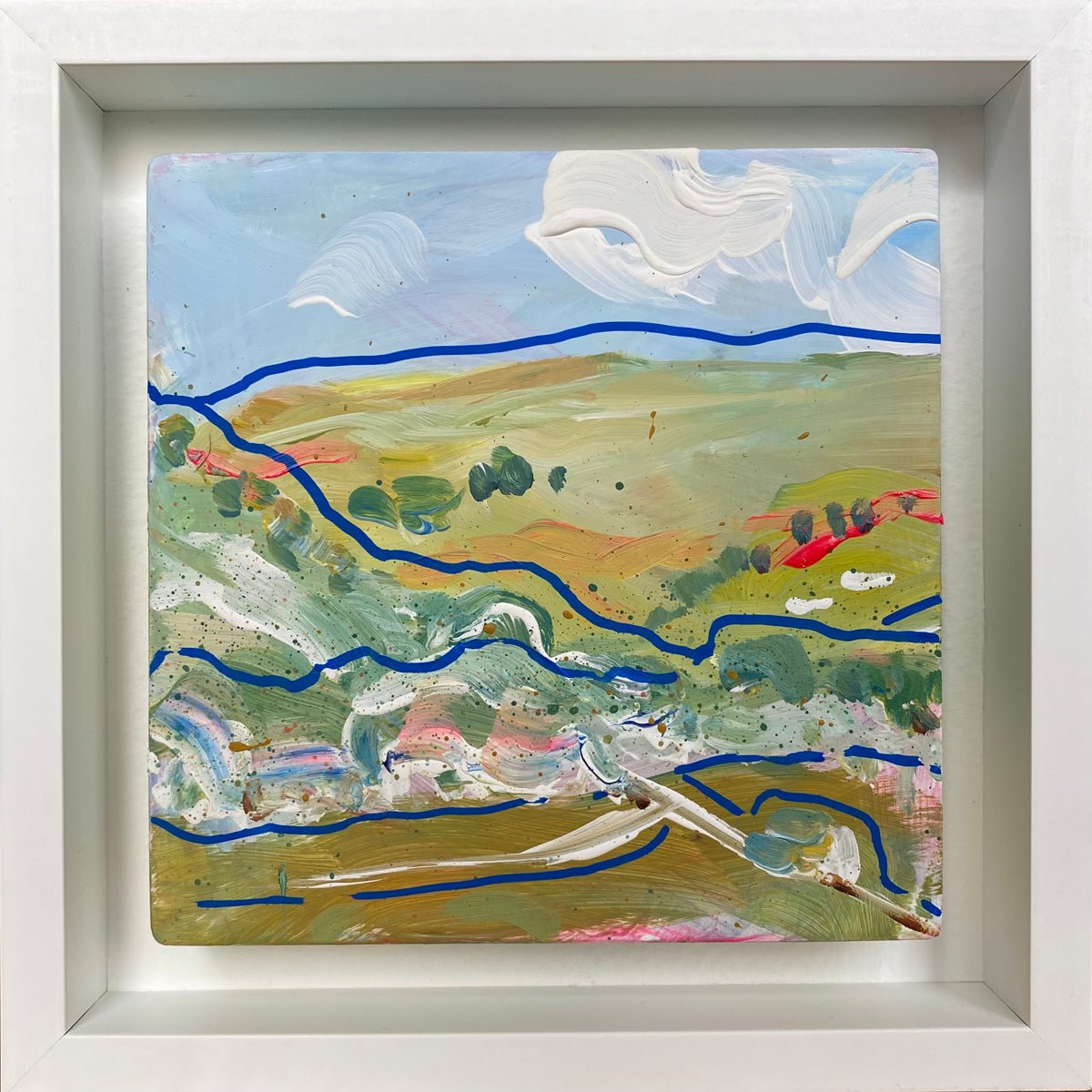 Mini abstract triptych painted with chalk paint and acrylic on a 12 x 12cm gesso block, featuring free-flowing blue lines and expressive strokes in white, green-blue, pink, and earth tones, mounted on watercolor paper and framed in a 15 x 15cm white wooden float frame.