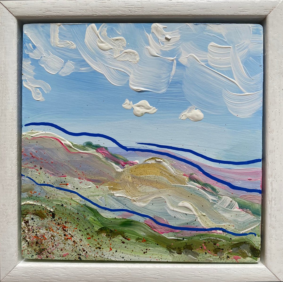 Mini abstract landscape triptych inspired by the Yorkshire Dales, painted directly on gesso block with chalk paint and acrylic in blues, white, purple, and pink, featuring fast-flowing blue lines, framed in a 15 x 15cm painted white wooden float frame.