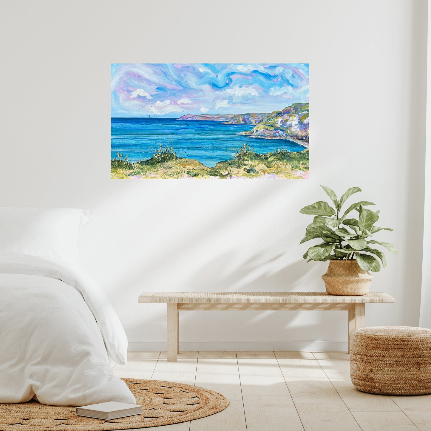 Bright, contemporary seascape of North Yorkshire coast with colourful sky, clouds, and mixed media textures displayed on wall