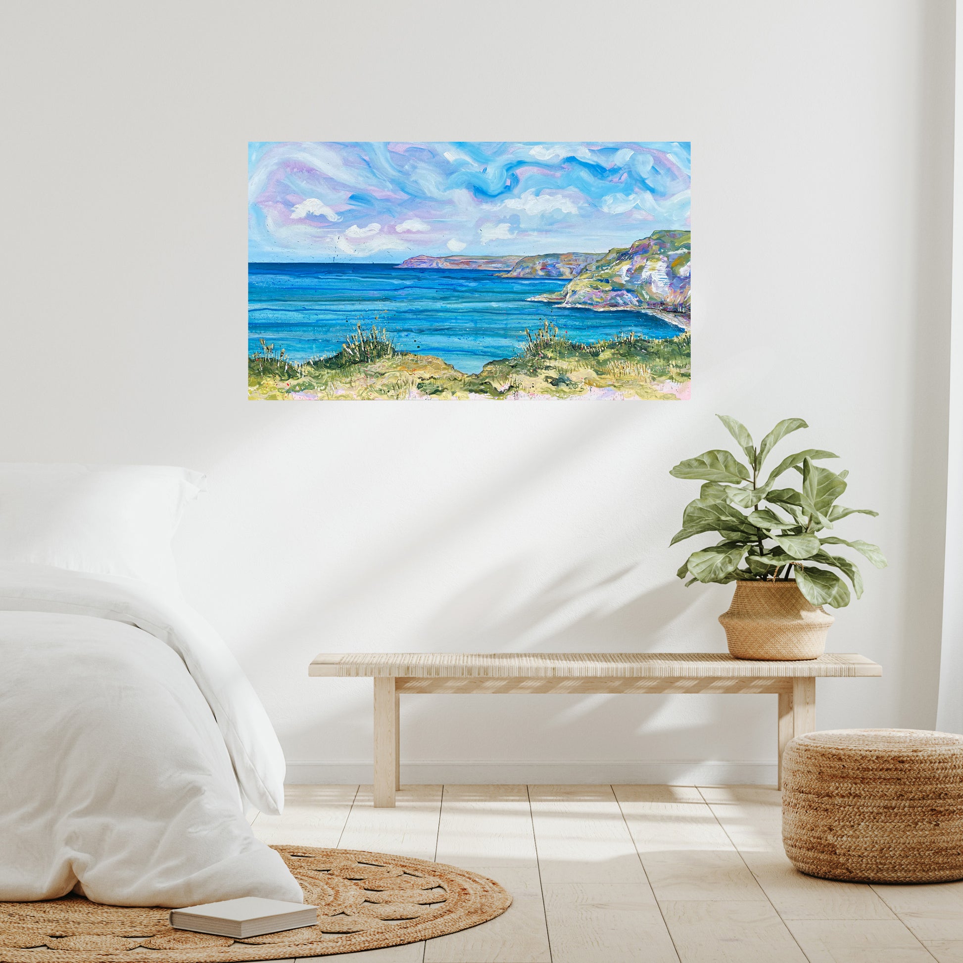 Bright, contemporary seascape of North Yorkshire coast with colourful sky, clouds, and mixed media textures displayed on wall