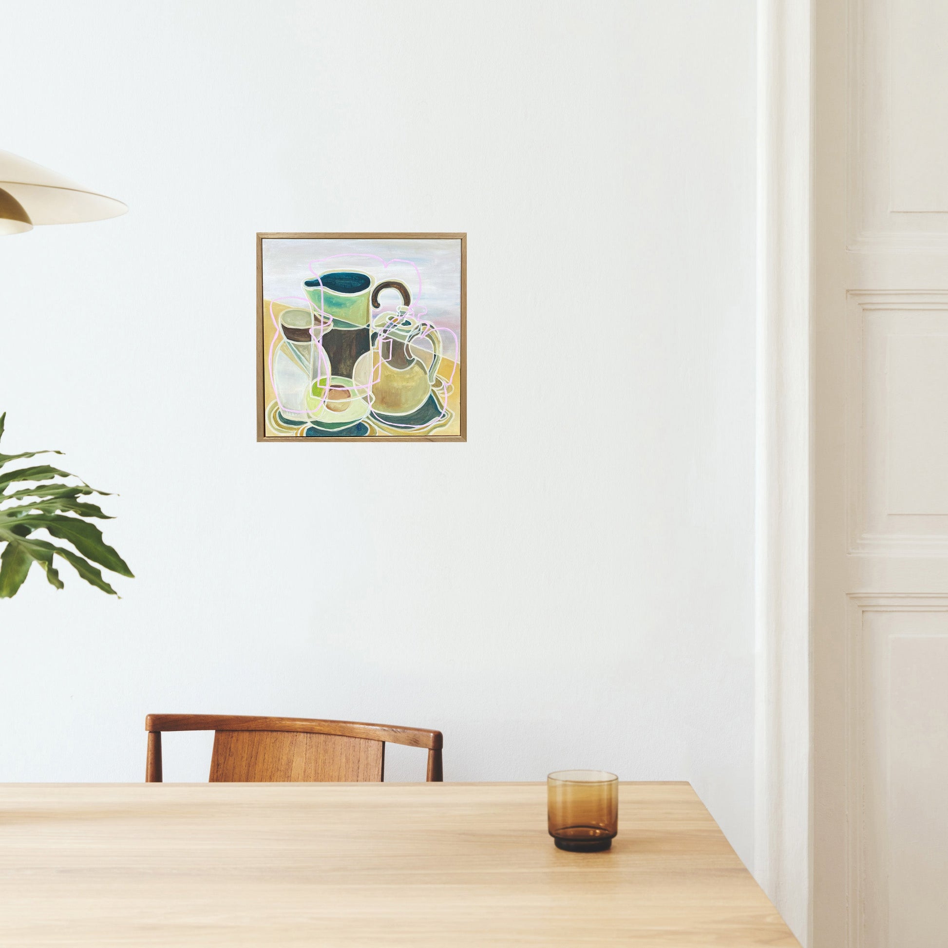 Avocado and Pottery with Pink Line” by Rebecca Carr – abstract still life featuring muted tones, soft forms, and a bold pink line connecting avocado and pottery; chalk paint and acrylic on canvas.